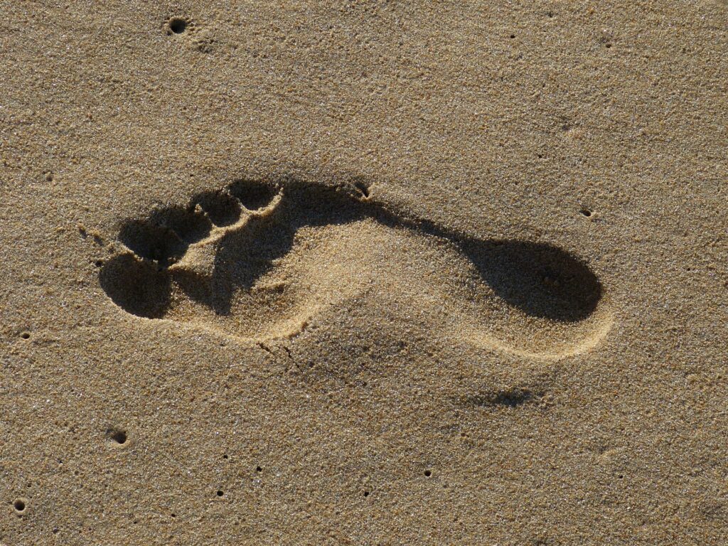 earthing footprint in the sand