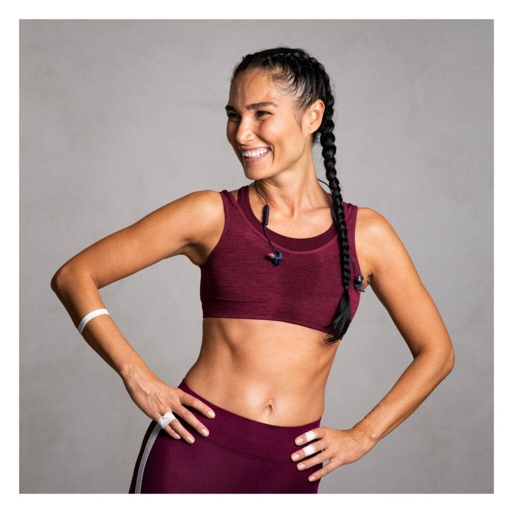 woman smiling in workout clothes