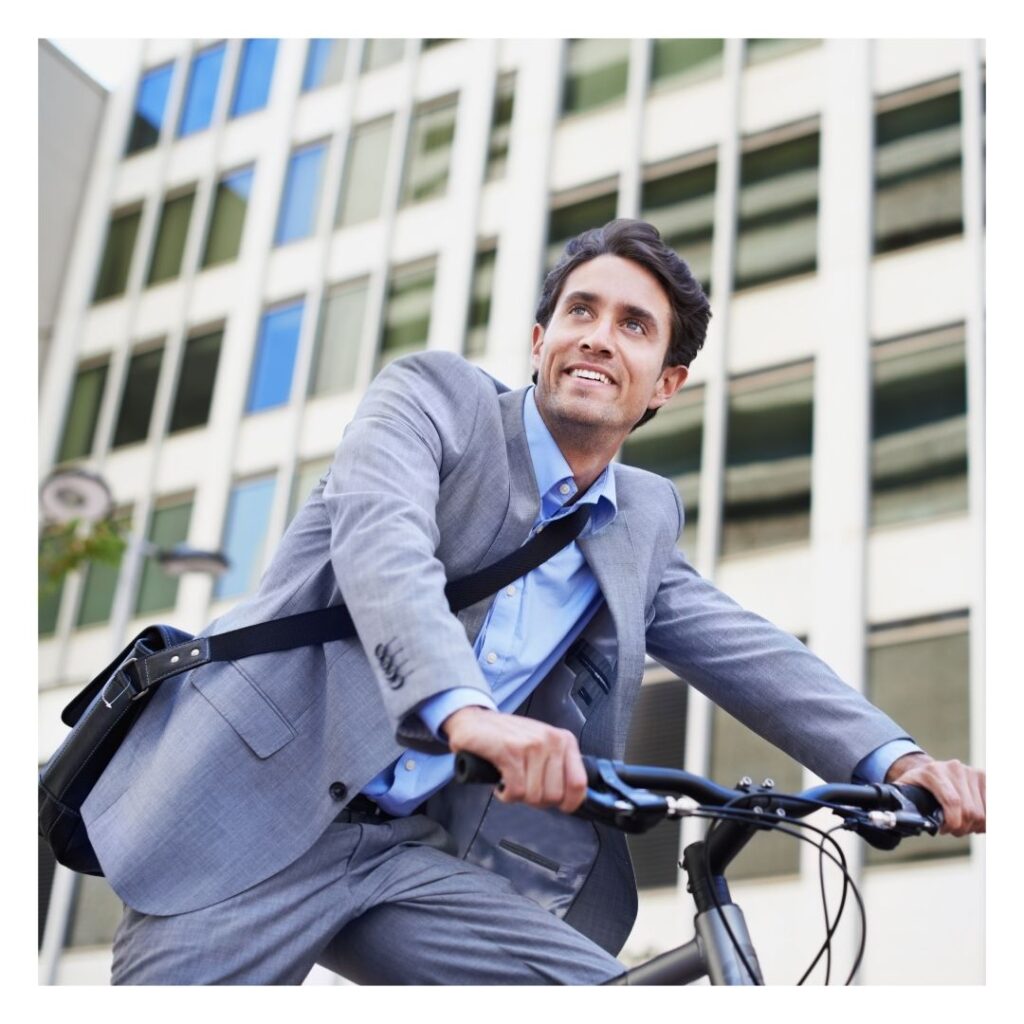 energized man riding a bike to work